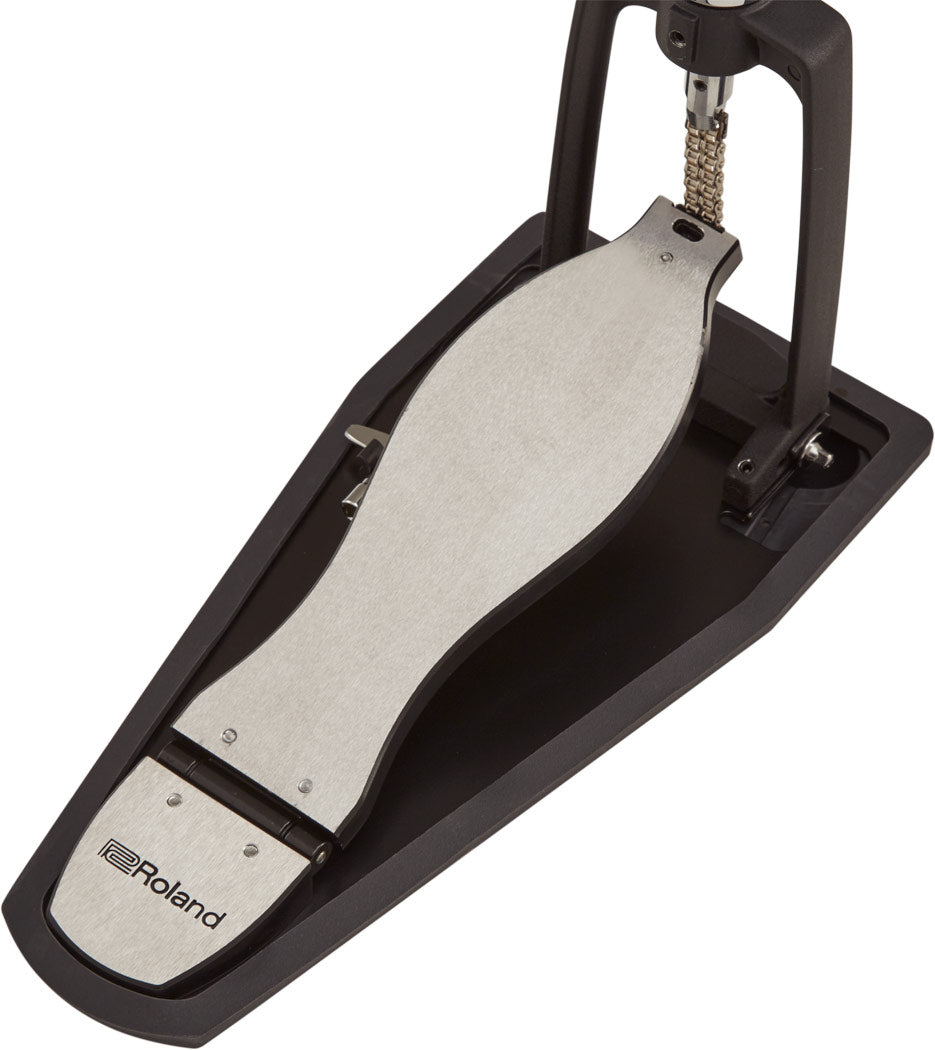 The image shows a Roland kick drum pedal with a black metal frame and a brushed silver footplate featuring the Roland logo. It has a chain drive mechanism, adjustable parts, and an ergonomic design for comfortable playing. Built with professional-grade quality, this pedal is commonly used with Roland electronic drum kits but can also work with acoustic sets.