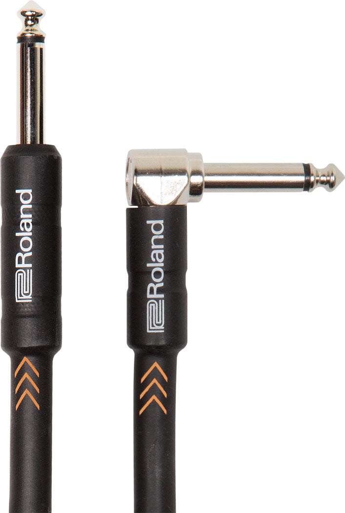 The image shows a Roland instrument cable with a straight 1/4" TS plug on one end and a right-angle 1/4" TS plug on the other. It features black and orange chevron-patterned jacket, nickel-plated metal connectors, and Roland branding on both plugs. Designed for guitars, basses, and keyboards, the right-angle plug helps reduce strain and save space when connecting to pedals or instruments.