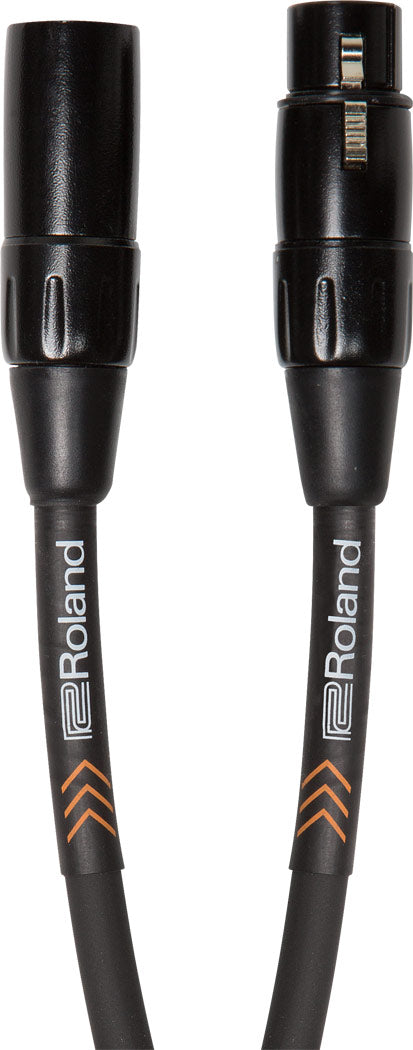 The image shows a Roland professional XLR audio cable with 3-pin connectors on both ends, black cable jacket with visible branding, and orange chevron accents. It features durable metal connector housings and is used for connecting microphones, audio interfaces, mixers, and other pro audio gear in studio recording, live sound, and balanced audio signal applications.