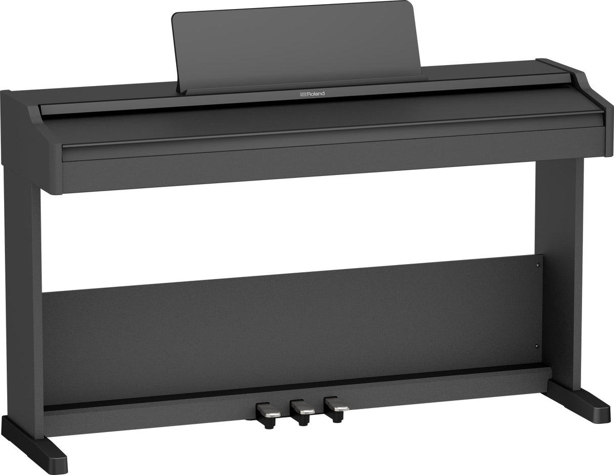 The image shows a Roland digital piano with a charcoal gray console-style cabinet. It features a full-size adjustable music rest, three pedals, and weighted keys for an acoustic feel. The sleek, minimalist design includes a sturdy built-in stand. This modern electronic instrument is ideal for home use and practice, offering volume control, headphone output, and the realistic sound and touch Roland is known for.