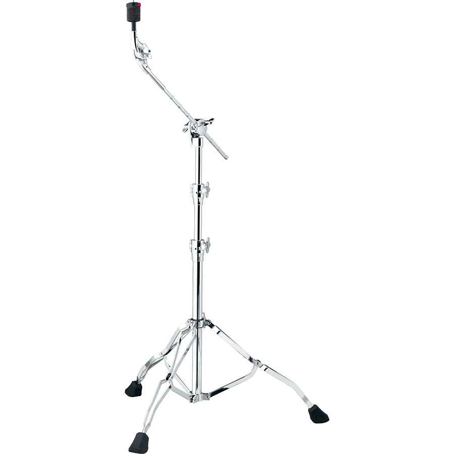 The image shows a chrome cymbal boom stand with a tripod base featuring rubber feet for stability. It has a telescoping main post for height adjustment and an angled boom arm to position cymbals at various angles and distances. Multiple wing nut clamps secure adjustments, and a cymbal holder with a felt washer tops the stand. This stand is used to place cymbals precisely in drum kits without obstructing the drummer.
