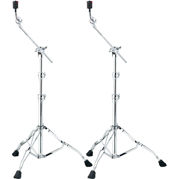 The image shows a pair of professional chrome-plated boom cymbal stands with sturdy tripod bases and rubber feet for stability. Each stand has adjustable height sections, angled boom arms for flexible positioning, wing nuts for securing adjustments, and cymbal felts at the top for mounting cymbals. These stands help drummers position cymbals at desired heights and angles, especially in tight drum kit setups.