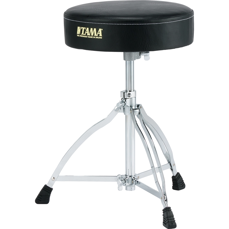 The image shows a Tama drum throne with a round, padded black seat featuring the gold "TAMA" logo and slogan. It has an adjustable chrome center post, a sturdy tripod base with rubber feet, and heavy-duty hardware. This professional drum stool offers comfort, stability, and ergonomic support, making it essential for drummers to maintain good posture and play comfortably.