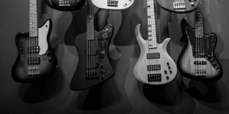 Closeup Of Guitars on Wall