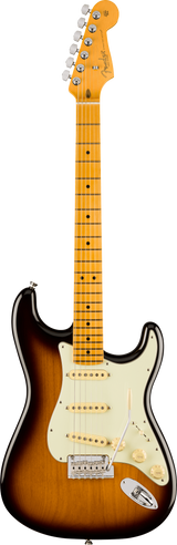 The image shows a Fender Stratocaster electric guitar with a classic double-cutaway body and sunburst finish. It features a cream pickguard, three single-coil pickups with white covers, chrome hardware, and a synchronized tremolo bridge. The maple neck has dot inlays and a natural finish, topped with a Fender headstock and six chrome tuning pegs. This design reflects vintage 1950s-60s Stratocaster styles.