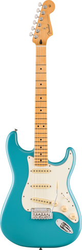 The image shows a Fender Stratocaster electric guitar with a turquoise blue solid body and classic double-cutaway shape. It has a white pickguard, three single-coil pickups with white covers, chrome hardware, a tremolo bridge, and standard controls. The maple neck features dot inlays and a natural finish, topped with the iconic Fender headstock and six chrome tuning pegs with the Fender logo.