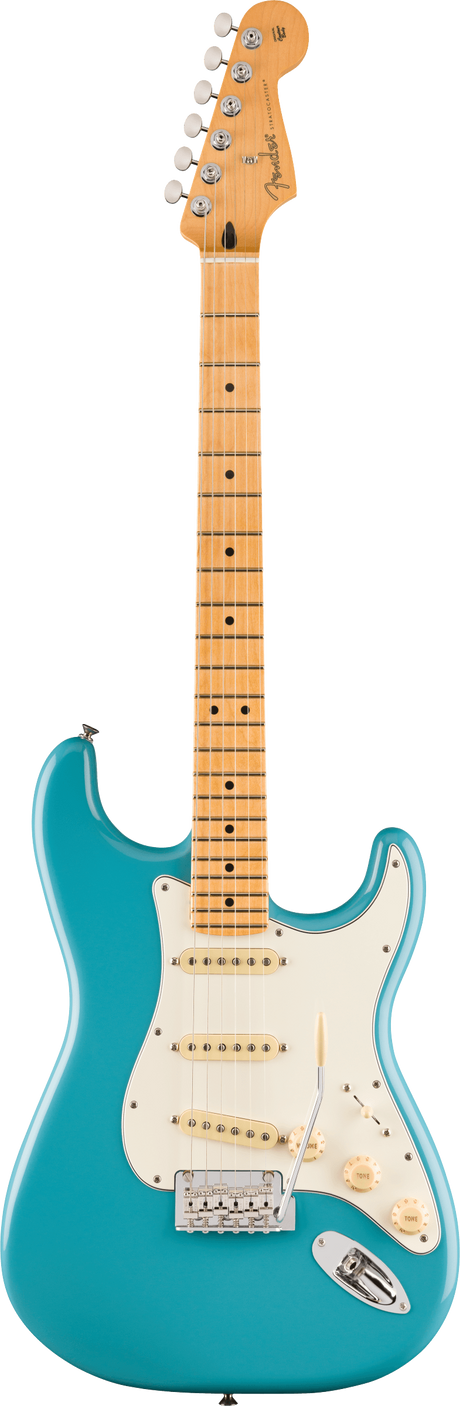The image shows a Fender Stratocaster electric guitar with a turquoise blue solid body and classic double-cutaway shape. It has a white pickguard, three single-coil pickups with white covers, chrome hardware, a tremolo bridge, and standard controls. The maple neck features dot inlays and a natural finish, topped with the iconic Fender headstock and six chrome tuning pegs with the Fender logo.