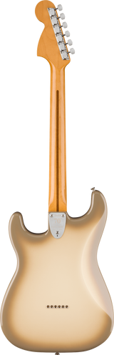 The image shows the back of a Fender Stratocaster-style electric guitar with a cream/blonde finish. It features a maple neck with a natural finish, six chrome tuning pegs in a 6-in-line headstock, a bolt-on neck with a visible neck plate, and a routed cavity for a tremolo system. The guitar has the classic contoured Stratocaster body and clean construction, suggesting a modern production model.
