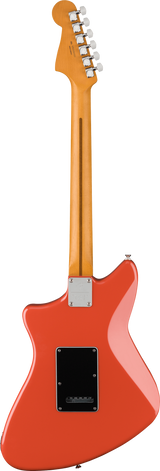 The image shows the back of a modern electric guitar with a natural maple neck and headstock featuring six chrome tuning pegs in a line, typical of Fender styles. The body is a glossy bright red-orange with an angular, offset shape reminiscent of a Jazzmaster. Visible hardware includes chrome tuning machines, a rectangular neck plate, and a black back cavity cover. The guitar combines classic Fender-inspired design with a vibrant finish.