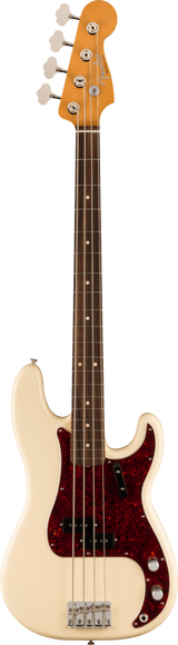 The image shows a Fender Precision Bass electric bass guitar with a cream-colored offset double-cutaway body, dark red tortoiseshell pickguard, and chrome hardware. It features a split-coil pickup, two control knobs, a maple headstock with the Fender logo, four vintage-style tuning pegs, and a rosewood fingerboard with dot markers. The bolt-on neck and four-string setup are typical of this classic, punchy-toned instrument.