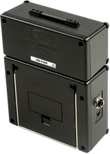 The image shows a black guitar amplifier stack with a two-piece design: a top amplifier head featuring controls and a carrying handle, and a bottom speaker cabinet with visible input jacks and a small port. This compact unit, likely tube or solid-state, is used to amplify and shape electric guitar sound. Its sturdy black finish suggests suitability for practice, recording, or small performances.