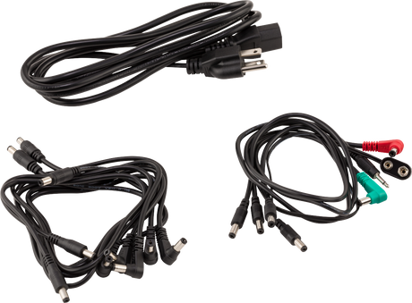 The image shows a collection of audio cables and connectors used in music production. At the top is a USB cable for digital instruments or interfaces. On the bottom left are 1/4" patch cables for guitars and synthesizers. On the bottom right is a bundle with RCA plugs and 1/4" connectors for linking mixers, audio interfaces, and sound systems. These cables are essential for connecting musical equipment in studios and live setups.