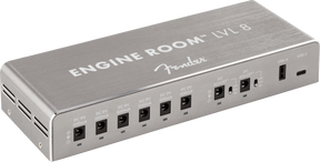 The image shows the Fender Engine Room LVL 8 power supply, featuring 8 isolated 9V outputs with varying milliamp ratings, a compact brushed aluminum metal housing, and USB ports. Designed for clean, stable power, it helps eliminate noise and ground loops, supports diverse pedal power needs, and keeps pedalboards organized. Ideal for medium to large setups, it reflects Fender’s professional build quality.