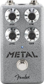 The image shows a Fender "Metal" distortion guitar effects pedal with a gray textured finish. It has four knobs—High (treble), Low (bass), Level (output volume), and Gain (distortion). The pedal includes two jacks at the top, a footswitch at the bottom, an LED indicator, and the Fender logo. Designed for heavy, distorted tones ideal for metal and hard rock guitar.