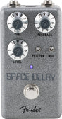 The image shows a Fender Space Delay guitar effects pedal with a compact gray/silver textured design. It has three main knobs (TIME, FEEDBACK, LEVEL), two smaller toggle switches (PATTERN, MOD), input/output jacks, a footswitch, a blue LED indicator, and the Fender logo. This digital delay pedal creates versatile echo and modulation effects, ideal for pedalboards.
