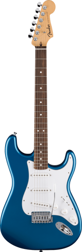 The image shows a Fender Stratocaster electric guitar with a blue metallic body, classic double cutaway shape, and a maple headstock featuring the Fender logo. It has six chrome tuners in a row, a dark rosewood fretboard with white dot markers, a white pickguard with three single-coil pickups, white control knobs, and a tremolo bridge. This iconic guitar is known for its versatile tone and comfortable playability.