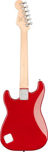 The image shows the back of a bright red (Candy Apple Red) Fender Stratocaster-style electric guitar. It has a natural maple neck and headstock with six chrome tuning pegs. A metal neck plate with a Fender logo attaches the neck to the body. The guitar features the classic contoured Stratocaster shape and a small rectangular cavity cover on the lower body. The clean finish suggests a new or promotional model of this iconic 1950s design.