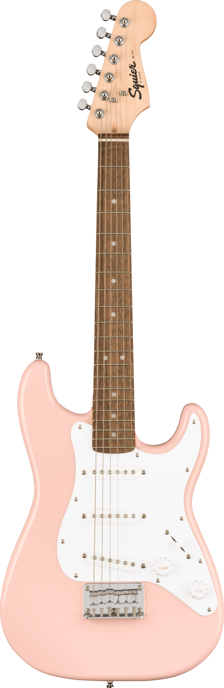 The image shows a Squier Stratocaster-style electric guitar with a distinctive shell pink finish. It features a solid body, white pickguard with three single-coil pickups, chrome hardware, a light maple headstock, and a darker fretboard with dot inlays. This budget-friendly model combines classic design and vintage-inspired style, making it ideal for beginners and intermediate players.