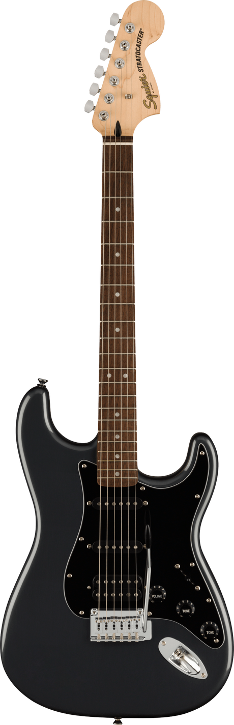 The image shows a Squier Stratocaster electric guitar with a black solid body and gloss finish. It features a maple neck with a rosewood fretboard, chrome 6-inline tuners, and visible Squier branding on the headstock. The guitar has three single-coil pickups with white covers, a black pickguard, standard Stratocaster controls, a 5-way switch, and a synchronized tremolo bridge. This budget-friendly model retains classic Strat design and playability.