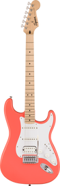 The image shows a Squier Stratocaster-style electric guitar with a coral pink contoured body and white pickguard. It features three pickups—two single-coils and a humbucker at the bridge—chrome hardware, a maple neck and fretboard with black dot inlays, and six-in-line chrome tuners. The Squier logo is visible on the headstock. This guitar offers a classic Fender look at an affordable price.