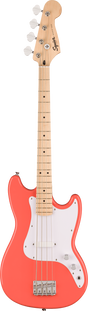 The image shows a Squier electric 4-string bass guitar with a bright coral body and white pickguard. It features a natural maple neck and fretboard, chrome tuning pegs, a single-coil pickup, and standard volume and tone knobs. The classic offset body and dot inlays reflect Fender’s style, combining vibrant aesthetics with accessible quality and classic bass sound.