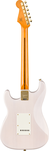 The image shows the back of a Fender Stratocaster-style electric guitar with a glossy light pink body and classic contoured shape. It has a maple neck with an amber tint, gold tuning pegs on the distinctive Fender headstock, and a neck plate with manufacturer markings. The clean, minimalist back reflects a high-quality finish, combining vintage-inspired aesthetics with a timeless, versatile design.