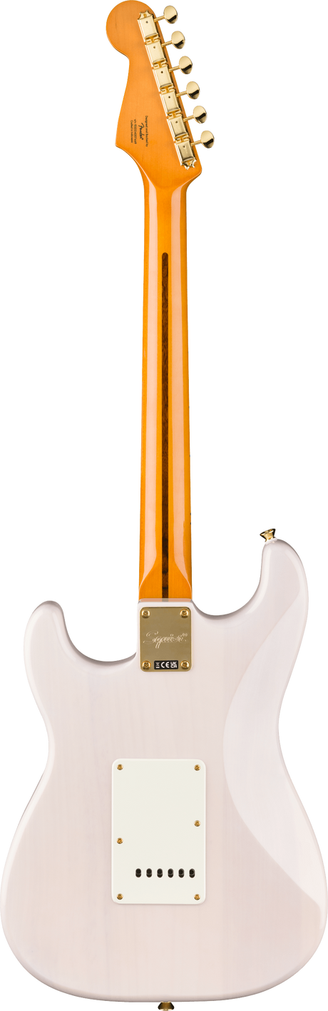 The image shows the back of a Fender Stratocaster-style electric guitar with a glossy light pink body and classic contoured shape. It has a maple neck with an amber tint, gold tuning pegs on the distinctive Fender headstock, and a neck plate with manufacturer markings. The clean, minimalist back reflects a high-quality finish, combining vintage-inspired aesthetics with a timeless, versatile design.