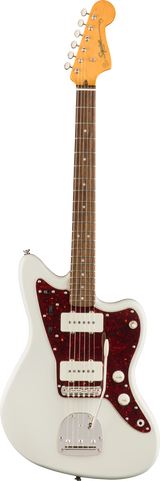The image shows a Squier Jazzmaster-style electric guitar with a white/cream solid offset body and glossy finish. It features a red tortoiseshell pickguard, two single-coil pickups, chrome hardware, multiple control knobs, and a chrome bridge. The maple neck has a rosewood or pau ferro fretboard with pearl dot inlays, and a natural maple headstock with a 6-in-line tuning peg layout and visible Squier logo.