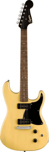 The image shows a Squier electric guitar with a yellow/cream double-cutaway body, black humbucker pickups, chrome hardware, and a black pickguard. It has a black headstock with the Squier logo and six inline tuning pegs, plus a dark wood fretboard with dot inlays. This affordable model, likely from the Contemporary or Modern series, offers solid build quality and high-output pickups suitable for rock, metal, and various styles.