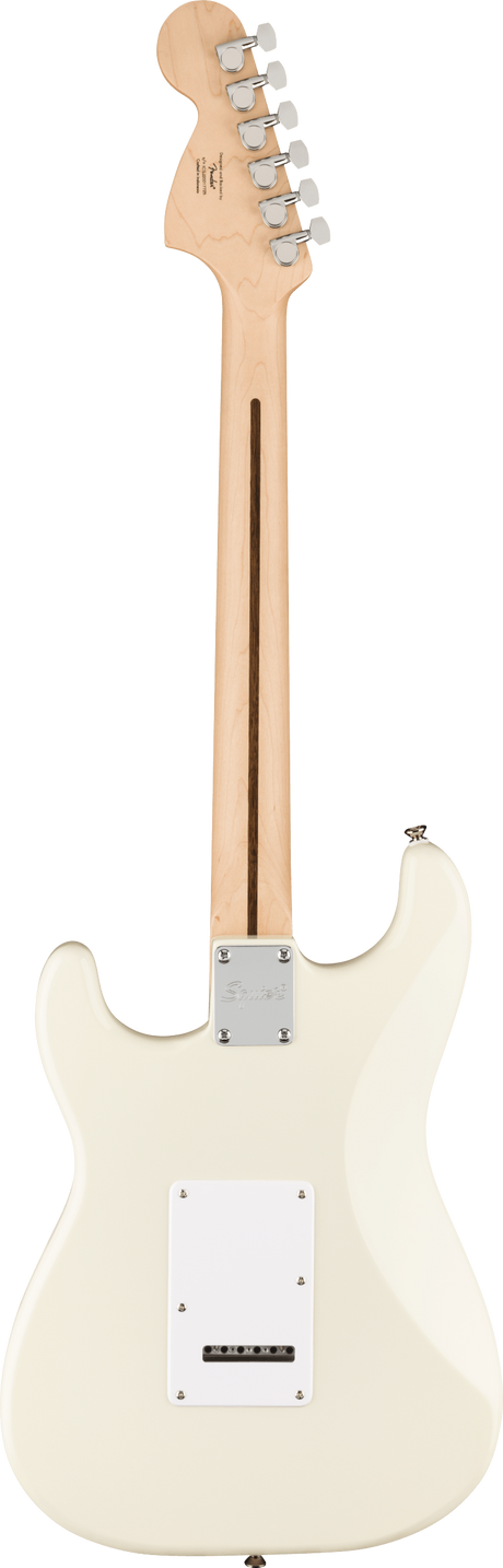 The image shows the back of a cream-colored Fender Stratocaster or similar electric guitar. It features a contoured body, a maple neck with six chrome tuning pegs in a line, and a visible headstock with branding. The back includes a white plastic electronics cover, a chrome neck plate, and a cavity cover for the tremolo system. This classic design remains iconic and widely used in electric guitars today.