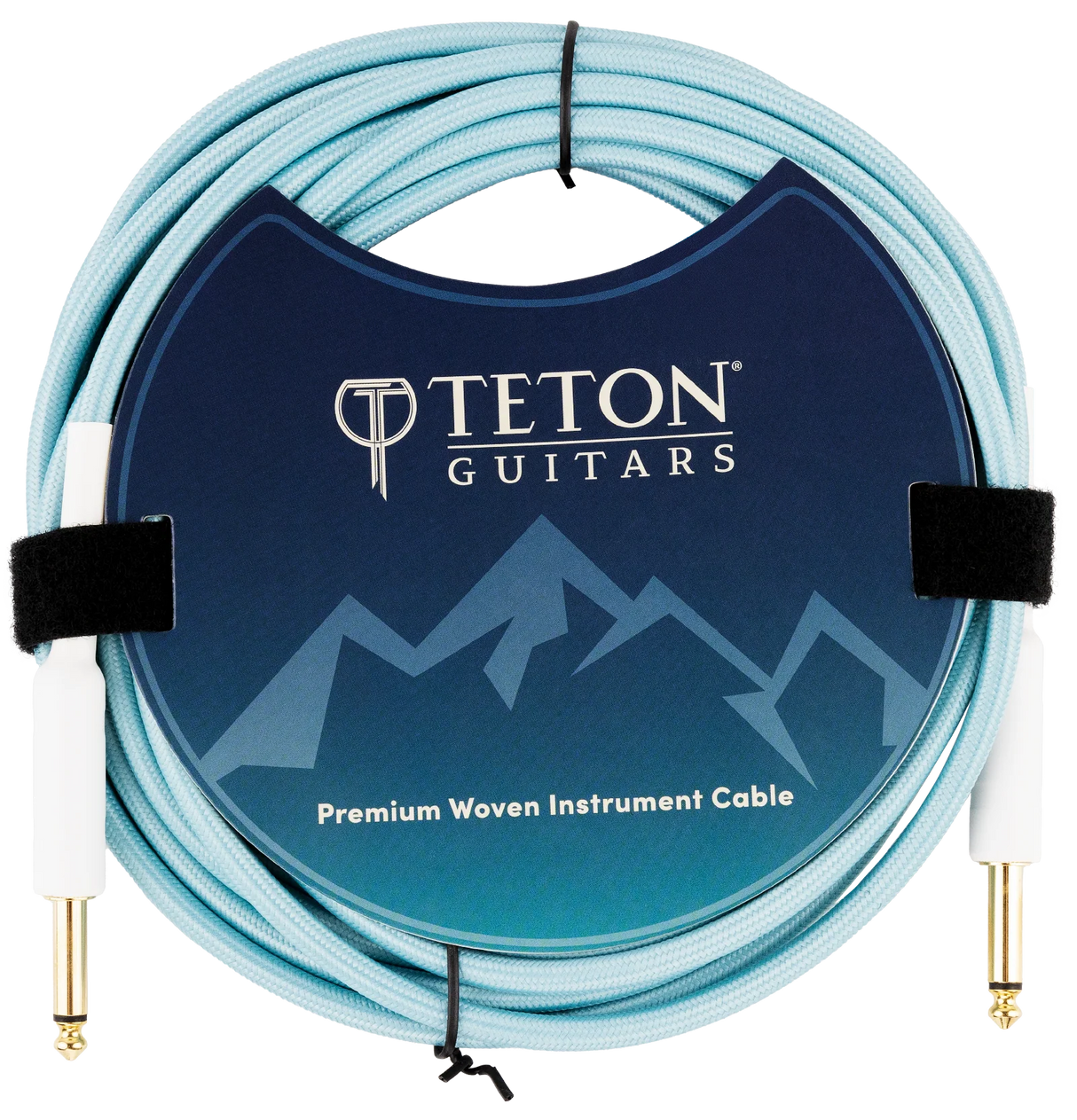 The image shows a Teton Teal 20ft guitar cable from the front, highlighting its teal-colored, coiled cable with metal connectors on both ends. The connectors have a durable, sleek design, and the cable appears flexible yet sturdy, suitable for professional guitar use. The background is plain, emphasizing the cable’s features and vibrant color.
