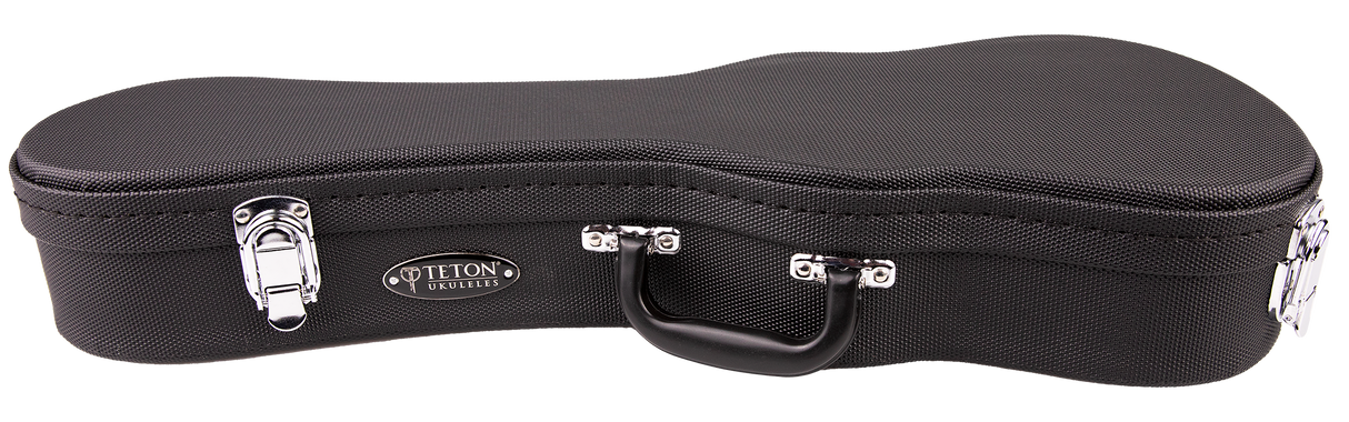 The image shows a Teton hard shell ukulele case with a curved shape matching a ukulele's contours. It has a black textured exterior, chrome metal latches and hinges, a black carrying handle, and an oval badge with the "TETON UKULELES" logo. Designed for secure transport, it offers professional-grade protection and fits Teton ukuleles or similarly sized instruments.