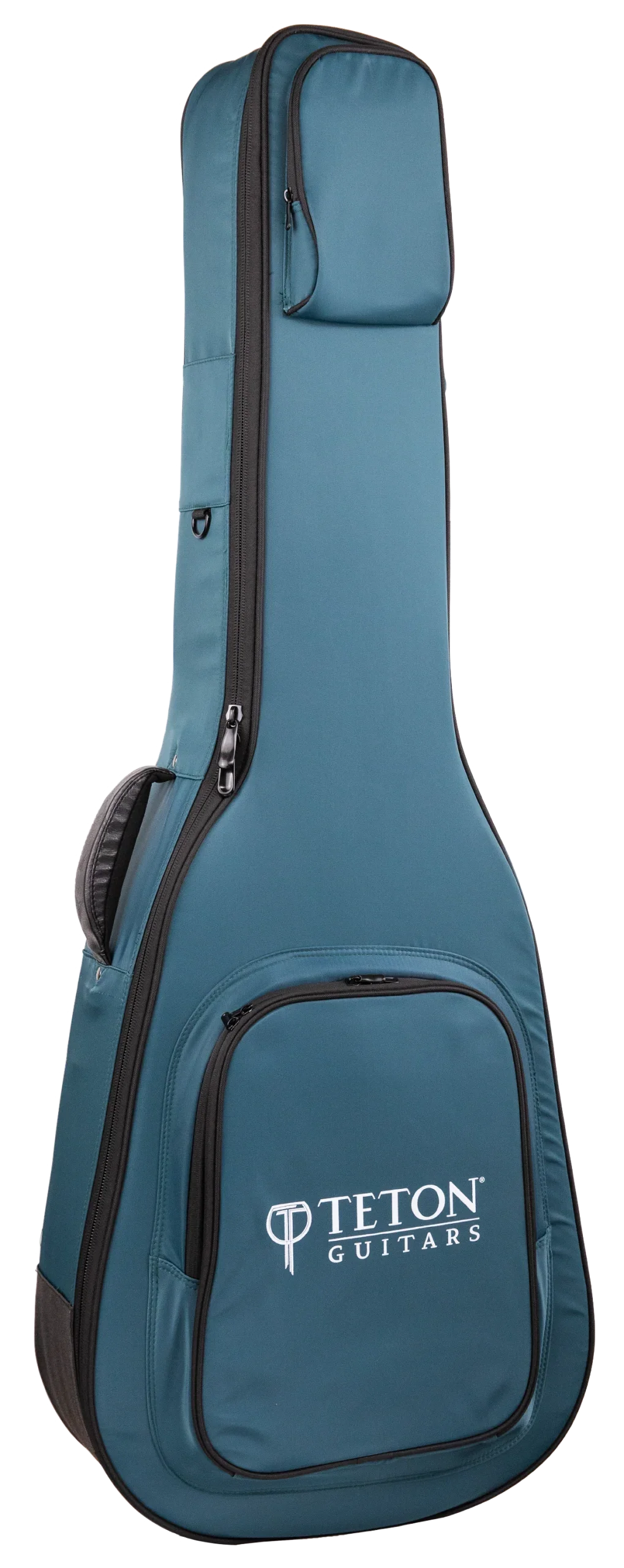 The image shows a teal/blue Teton Guitars padded gig bag shaped for acoustic guitars. It features the "TETON GUITARS" logo on the front pocket, multiple zippered compartments, padded shoulder straps, black zipper trim, and durable fabric. Designed for safe, lightweight transport, this soft case is ideal for carrying acoustic guitars and complements Teton’s branded instruments.