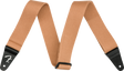 The image shows a tan/brown woven cotton or canvas guitar strap with black leather Fender-branded end tabs. It has an adjustable length and a classic, functional design. This essential accessory helps guitarists and bassists comfortably play while standing by distributing the instrument’s weight across the shoulder and torso, suitable for various musical styles and performance settings.