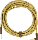 The image shows a Fender guitar cable with a yellow/tan tweed woven fabric covering featuring a diamond pattern. It has gold-plated 1/4" connectors: one straight and one right-angle plug. A brown fabric band with the Fender logo wraps the coiled cable. Designed for electric instruments, the vintage-style sheath offers durability, reduced tangling, and a classic look, while the right-angle plug minimizes strain on guitar input jacks.