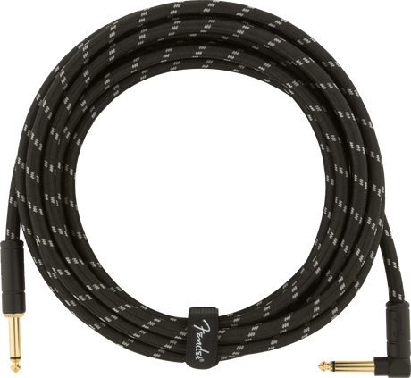 The image shows a high-quality instrument cable with a black braided exterior and white accents. It has gold-plated 1/4" TS connectors—one right-angle and one straight—for reduced strain. A Fender-branded cable tie secures it. The durable braided shielding minimizes interference, ensuring clear signal transmission. This premium cable is ideal for guitars, basses, and other electric instruments.