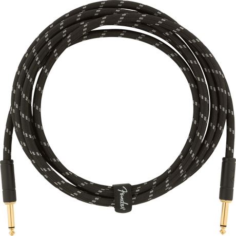 The image shows a Fender instrument cable with gold-plated 1/4" connectors on both ends and a black braided jacket. The durable woven design reduces tangling, and the cable features Fender branding. This professional-grade cable is designed for electric guitars, basses, and other instruments, ensuring reliable signal transmission and minimizing interference for stage or studio use.