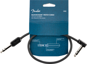 The image shows a Fender Blockchain Patch Cable, a 16" (0.41m) stereo TRS cable with one straight and one angled connector. It features 24 AWG oxygen-free copper conductors, 90% OFC spiral shielding, and a 4.1mm PVC jacket. The black cable has Fender branding on the connectors and comes in blue packaging. Designed for guitar pedals and audio gear, it’s ideal for compact pedalboards and studio setups.