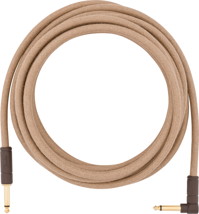The image shows a guitar instrument cable with a tan braided cloth exterior for durability and a vintage look. It has 1/4" mono gold-plated connectors—one straight and one right-angle—for versatile connections to guitars, pedals, or amps. This high-quality cable ensures reliable signal transmission while minimizing noise and protects internal wiring with its cloth covering.