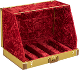 The image shows a professional multi-guitar case with a hard shell and tweed-textured exterior. It features gold/brass hardware, multiple padded compartments for electric guitars, and a luxurious red crushed velvet interior lining for protection. Designed for musicians, collectors, and studios, this premium case offers secure transport and storage, safeguarding instruments from scratches, impacts, and environmental damage.