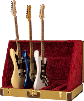 The image shows a vintage-style tweed guitar case or display stand with a red velvet interior holding three Stratocaster-style electric guitars. From left to right, the guitars are cream, blue, and white, each featuring single-coil pickups, tremolo bridges, maple necks with rosewood fretboards, and six strings. The case appears designed for elegant presentation or collector display.