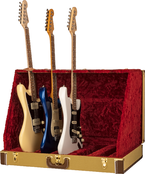 The image shows a vintage-style tweed guitar case or display stand with a red velvet interior holding three Stratocaster-style electric guitars. From left to right, the guitars are cream, blue, and white, each featuring single-coil pickups, tremolo bridges, maple necks with rosewood fretboards, and six strings. The case appears designed for elegant presentation or collector display.