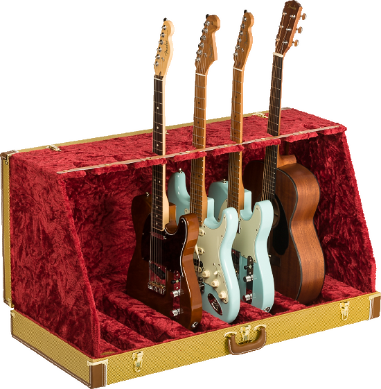 The image shows a professional guitar display case with a textured golden-yellow exterior and plush red velvet interior. It holds multiple guitars, including Fender-style electric guitars in black, cream, and blue, plus a natural wood acoustic guitar. The case features metal reinforcements, secure latches, and compartments for safe storage and display, ideal for musicians, collectors, or music stores.