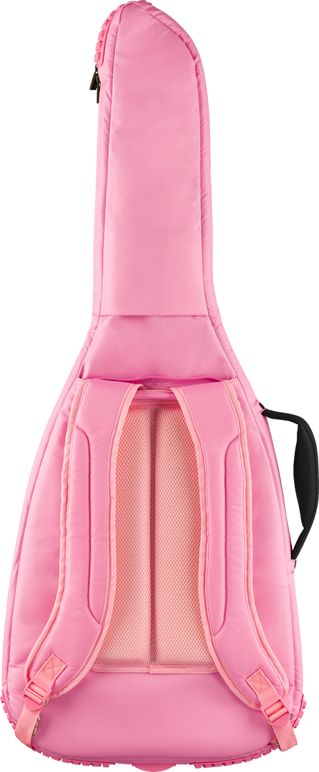The image shows a bright pink padded guitar gig bag with a tapered guitar shape. It features backpack-style mesh-padded shoulder straps, a top carry handle, and a full-length zipper. Designed for protection and easy transport, this soft case is popular with guitarists for its comfort, padding, and standout color.