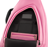The image shows a pink musical instrument gig bag opened to reveal a black padded interior with compartments, pockets, a zippered section, and straps to secure an instrument. Designed for guitars, keyboards, or similar instruments, the well-constructed case offers protection and organization, making it ideal for musicians transporting their gear to performances, lessons, or recording sessions.