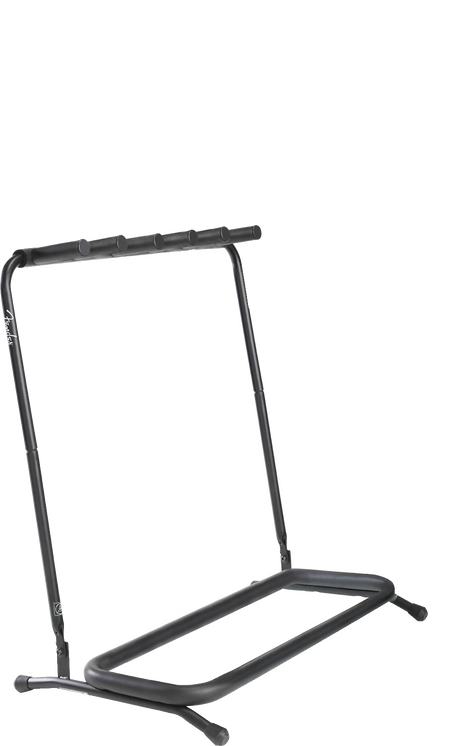 The image shows a black metal multi-guitar stand with a tripod base and angled top rail holding five guitar neck holders. It features adjustable height, a sturdy rack-style design, and a visible "Fender" logo. The stand supports various guitars, including acoustic, electric, and bass, for secure and accessible storage, commonly used by musicians, studios, and music stores.