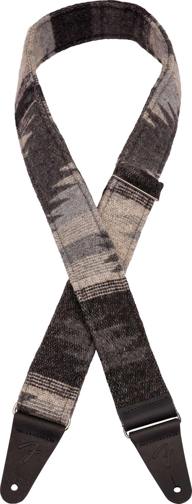 The image shows a guitar strap with a grayscale woven pattern in shades of gray and black. It has dark leather or synthetic leather end tabs with adjustment holes for attaching to a guitar. This strap combines functionality and style, allowing musicians to play standing while supporting the instrument’s weight. Its modern design and adjustable length offer comfort and a sophisticated look that suits various guitars and playing styles.