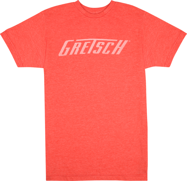 The image shows a coral/orange-red t-shirt with "GRETSCH" printed in white across the chest. This shirt is branded merchandise from Gretsch, a renowned musical instrument company known for guitars, drums, and other instruments since 1883. Gretsch is especially famous for its hollow-body electric guitars favored by many iconic musicians.