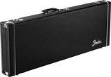 The image shows a classic black Fender hardshell guitar case with chrome metal hardware, including latches, hinges, and a carrying handle. The white Fender logo is prominently displayed on the front. Designed for electric guitars, the sturdy case features reinforced corners and secure latches to protect instruments during transport and storage. Its textured black exterior offers durability and a professional look, making it a trusted choice for guitarists.