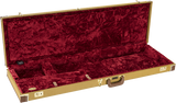 The image shows a deluxe electric guitar case with a hard golden/tweed exterior and plush burgundy interior. It has custom compartments for the guitar’s body, neck, and headstock, metal latches, corner reinforcements, a carrying handle, and a small accessory compartment. Designed to protect guitars during transport, it prevents damage with a secure, fitted interior and durable outer shell.